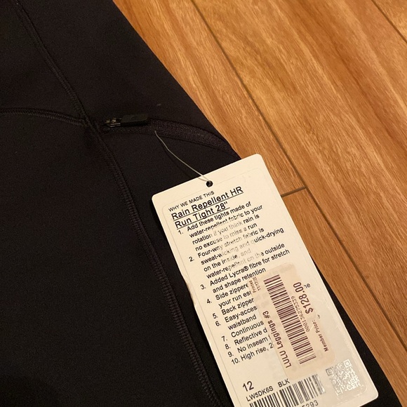 NWT Lululemon rain-repellent HR Run Tights,sz 12, length 28”. Logo on left calf. - Picture 7 of 14